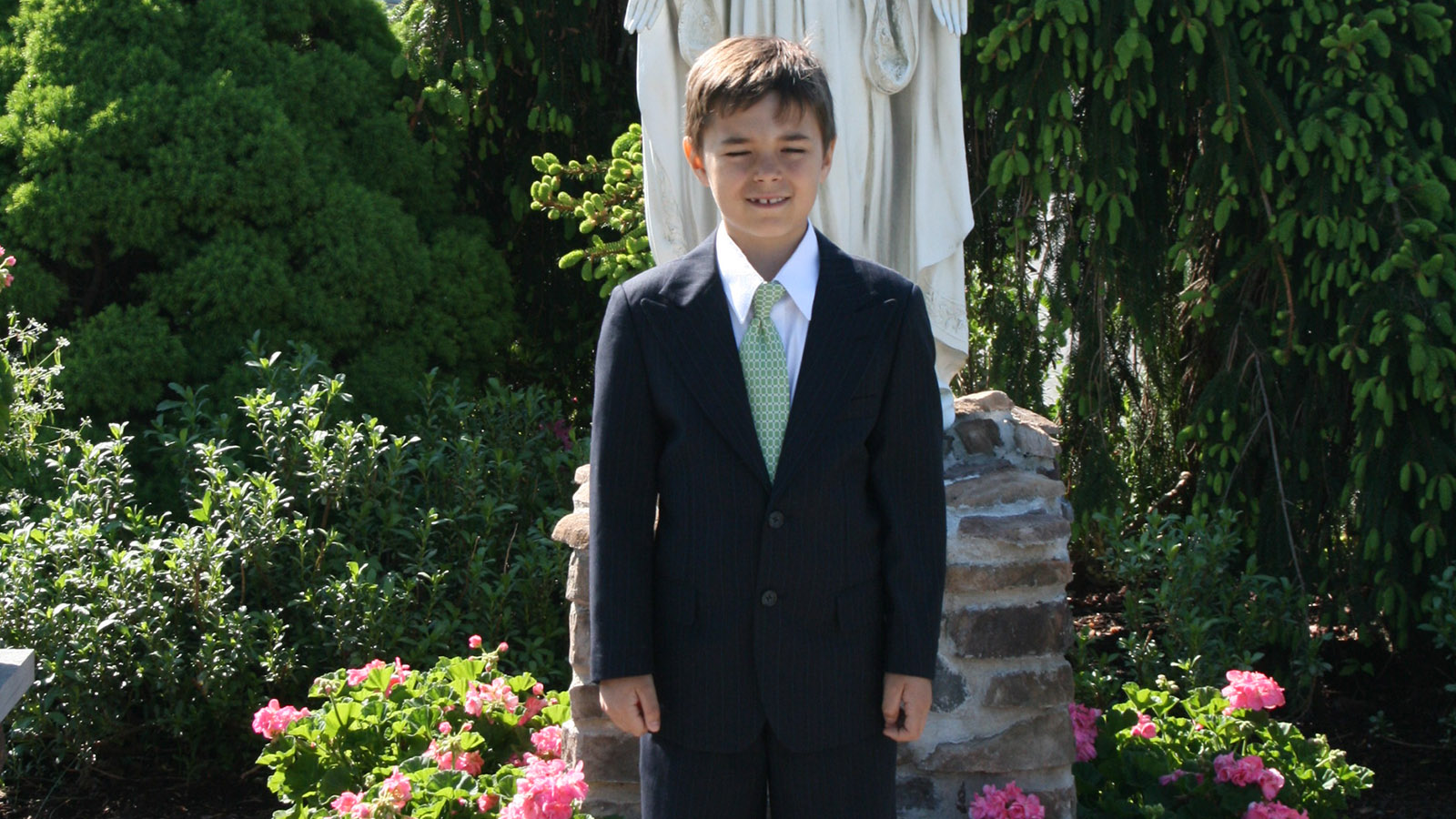 Young Joey Edwards wearing a suit